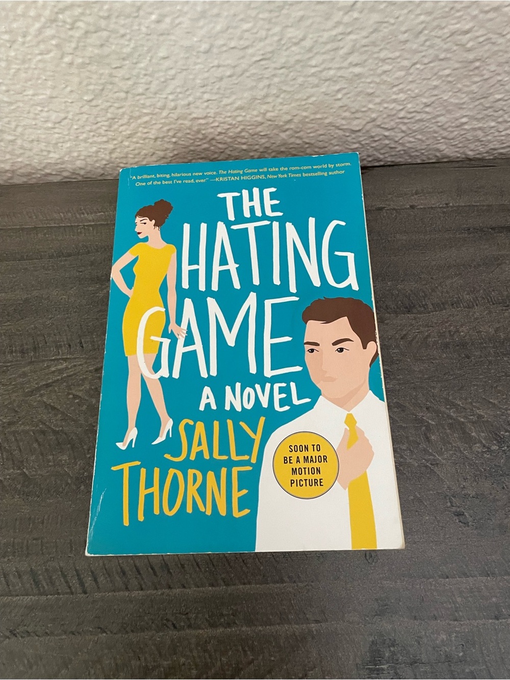 The Hating Game by Sally Thorne Teal & Yellow Paperback Novel